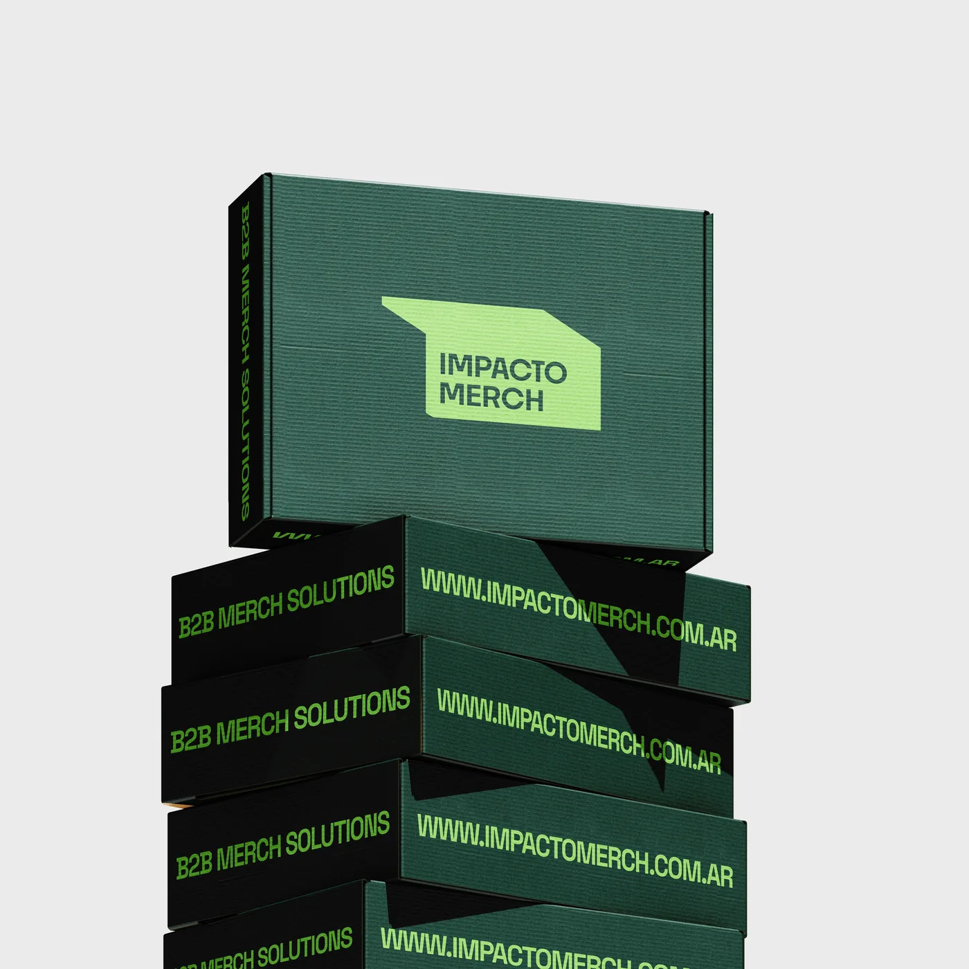 Cajas apiladas de kits empresariales de Impacto Merch